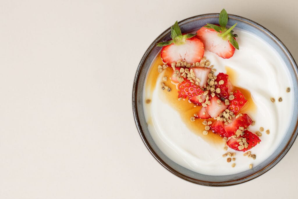Natural Life Western Australian Bee Pollen. Lady scooping out the granules